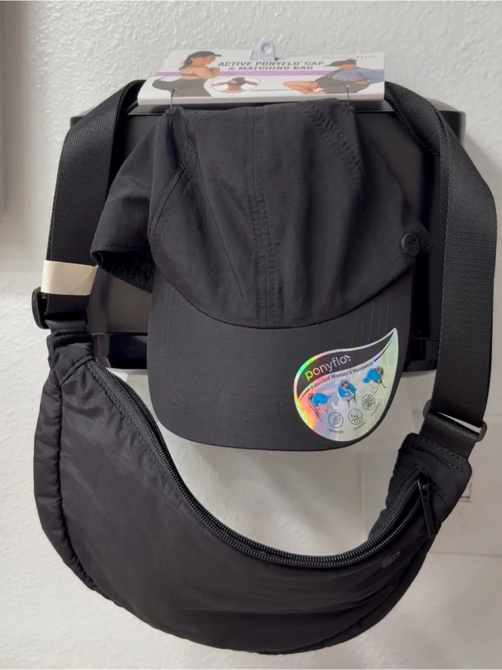 Ponyflo Black Active Ponyflo Cap with Matching Black Bag.